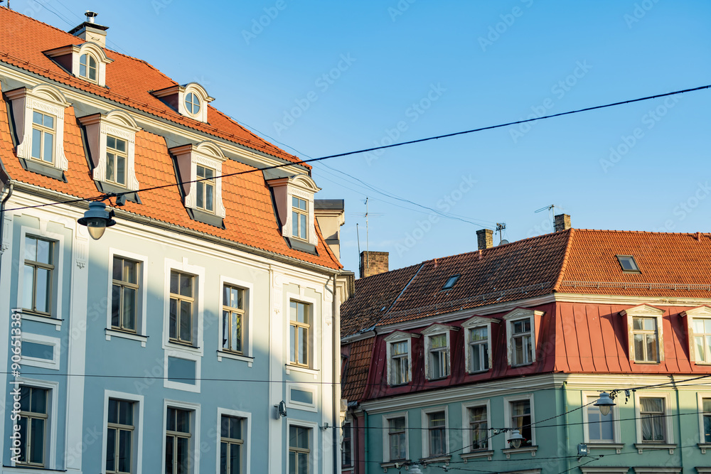 Colorful cobblestone streets of Riga. Vibrant city life in the capital of Latvia Colorful cobblestone streets of Riga. Vibrant city life in the capital of Latvia