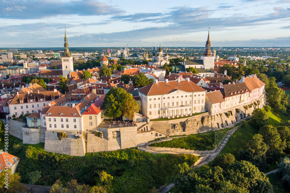 Fototapeta premium Iconic aerial skyline view of Tallinn Old Town and Toompea hill on a sunny summer evening. Stenbock House, Patkuli viewing platform, defensive walls, rooftops.