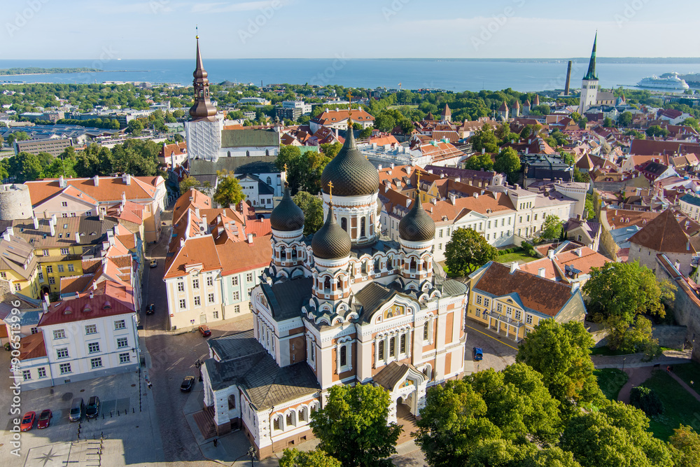 Aerial view of Alexander Nevsky Cathedral in Tallinn Old Town on a sunny summer morning. St. Mary's Cathedral, defensive walls, rooftops. Aerial view of Alexander Nevsky Cathedral in Tallinn Old Town on a sunny summer morning. St. Mary's Cathedral, defensive walls, rooftops.