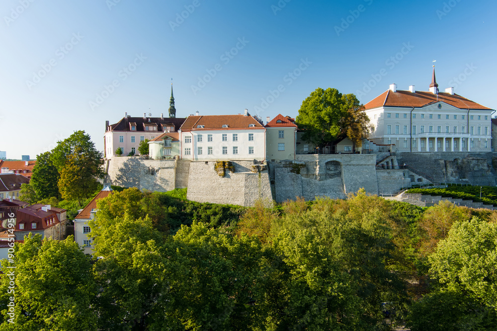 Iconic aerial skyline view of Tallinn Old Town and Toompea hill on a sunny summer evening. Stenbock House, Patkuli viewing platform, defensive walls, rooftops. Iconic aerial skyline view of Tallinn Old Town and Toompea hill on a sunny summer evening. Stenbock House, Patkuli viewing platform, defensive walls, rooftops.