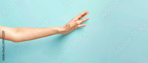 Wallpaper Mural Woman's Hands Holding Something Gesture Isolated on Pastel Blue Background, High-Resolution Hand Gesture, Clean and Minimalist Design, Ideal for Product Presentation and Design, Soft and Elegant Torontodigital.ca