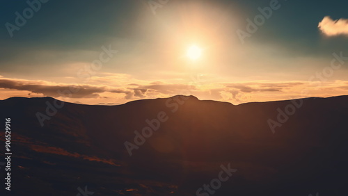 Wallpaper Mural Witness the breathtaking transformation of light as the sun sets over the stunning Carpathian Mountains, casting warm hues across the expansive landscape. Torontodigital.ca