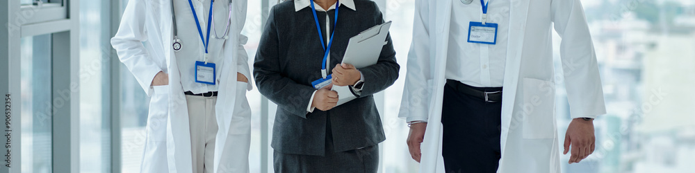 Header with people walking in hospital corridor Header with people walking in hospital corridor