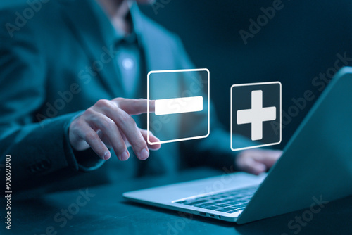 shows icon plus and minus. businessman selects the minus sign. concept of comparing pros and cons, opposite negative positive, the decision to choose plus vs minus, versus good and bad