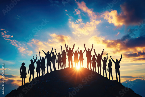 Silhouettes of group people men and women standing in celebration their victory at sunset