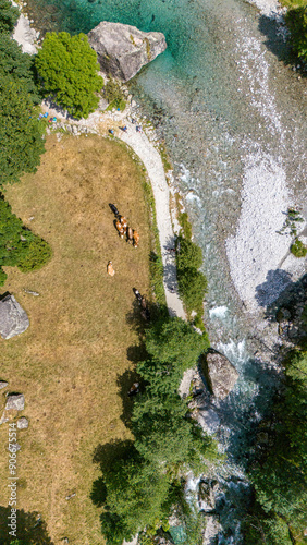 Aerial view of Val di Mello, a green valley surrounded by granite mountains and woods, renamed the Italian Yosemite Valley by nature lovers. Val Masino, Valtellina, Sondrio. Italy