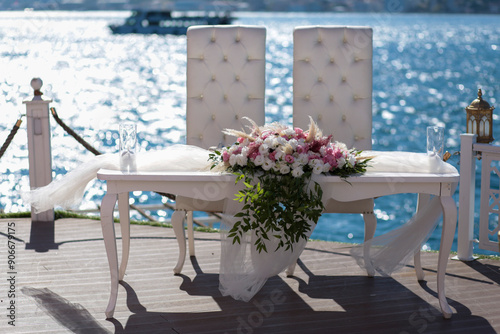 Fototapeta Naklejka Na Ścianę i Meble -  A romantic and elegant wedding ceremony setup with a stunning view of the Bosphorus