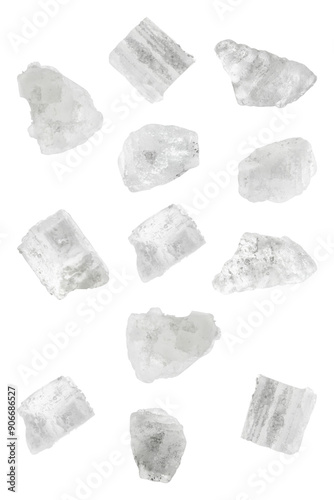 Sea salt crystals in air on white background