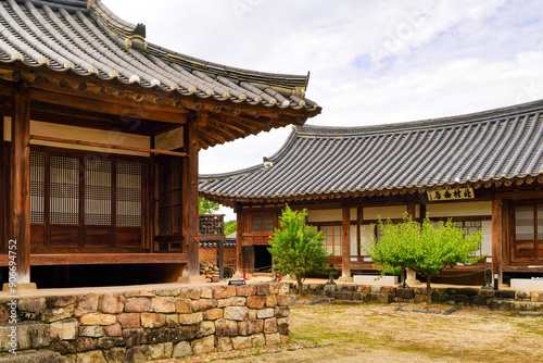 Andong-si, Gyeongsangbuk-do, South Korea - September 11, 2022: Summer view of yard and tile-roofed Bukchon House at Andong Hahoe Village 