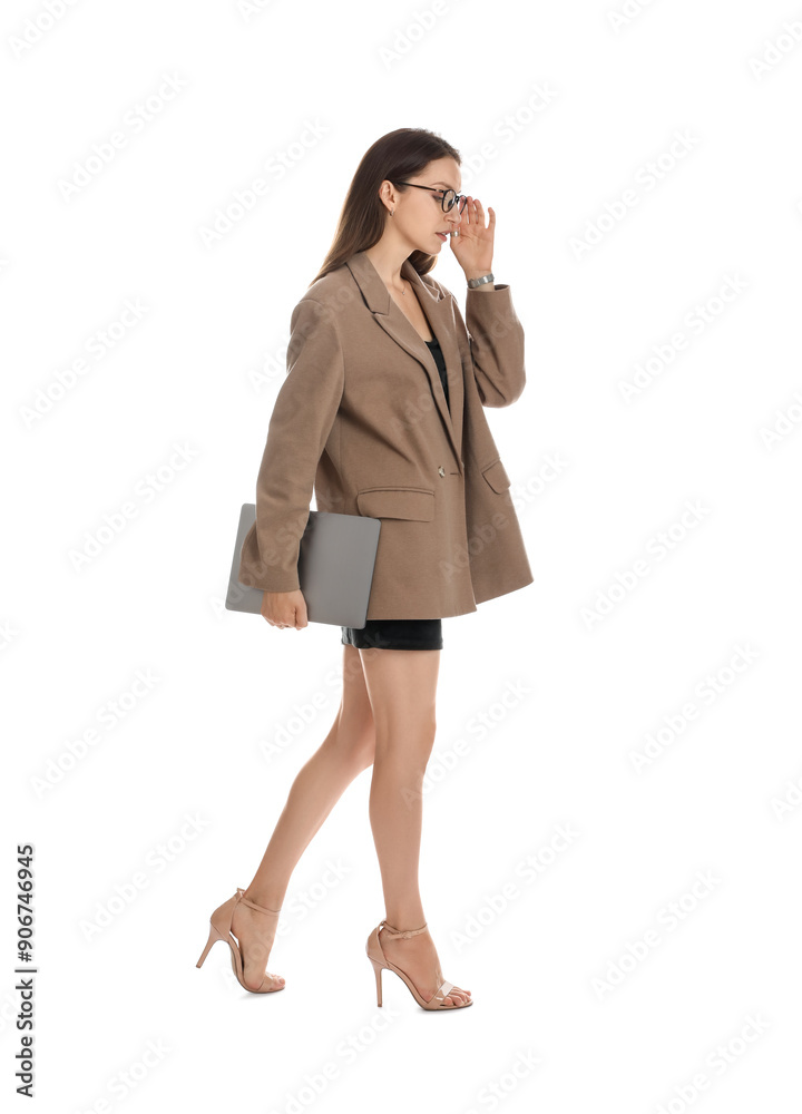 Beautiful woman in stylish brown jacket, glasses and black dress with laptop on white background Beautiful woman in stylish brown jacket, glasses and black dress with laptop on white background