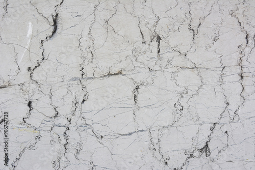 Concrete rough wall surface with cracks 