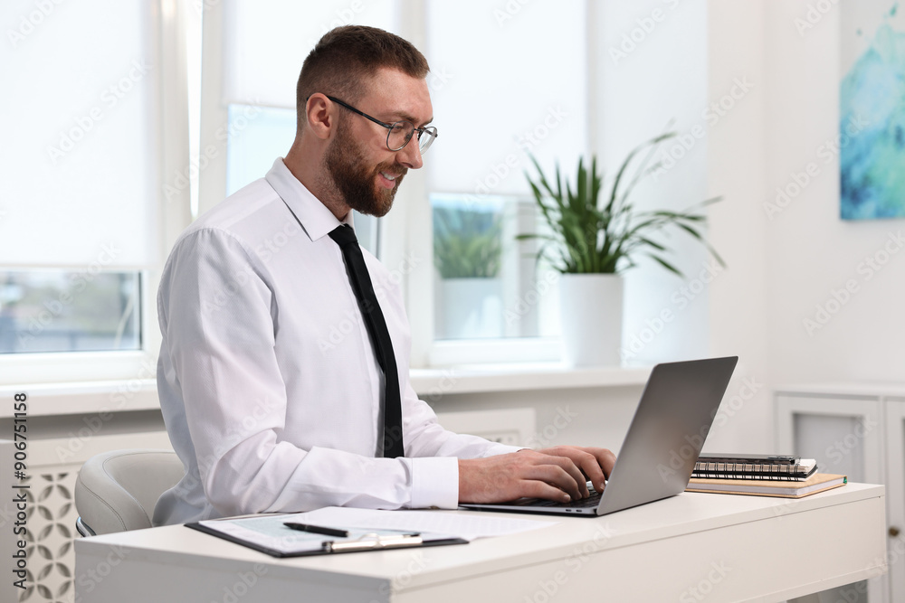 Man with good posture working in office Man with good posture working in office