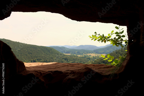 Aussicht in den Pfälzerwald von einer Schießscharte in den Altdahner Burgen bei Dahn iim deutschen Landkreis Südwestpfalz im Bundesland Rheinland-Pfalz. Aussicht vom Premium-Wanderweg Hahnfels-Tour. photo