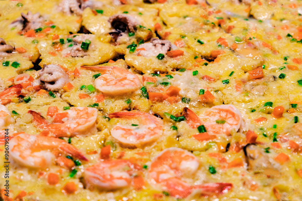 omelette with shrimp and seafood on street food market omelette with shrimp and seafood on street food market