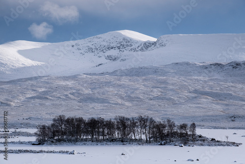 A frozen Loch Ba backed by Beinn a Chreachain in winter, Rannoch Moor, Argyll and Bute, Scottish Highlands, Scotland, United Kingdom, Europe photo