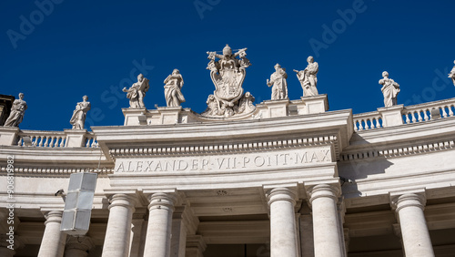 Detail of Doric colonnades in St. Peter's Square framing the entrance to St. Peter's Basilica, Vatican City, the papal enclave in Rome, UNESCO World Heritage Site, Rome, Lazio, Italy, Europe