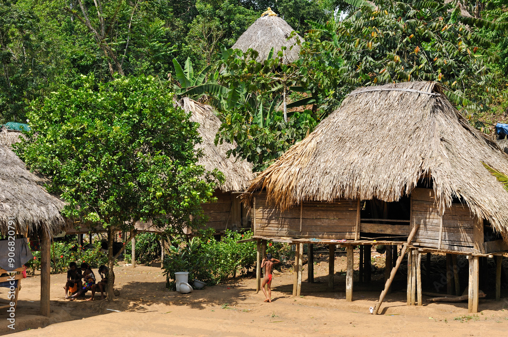 Thatched houses in a village of Embera native community living by the Chagres River within the Chagres National Park, Republic of Panama, Central America Thatched houses in a village of Embera native community living by the Chagres River within the Chagres National Park, Republic of Panama, Central America