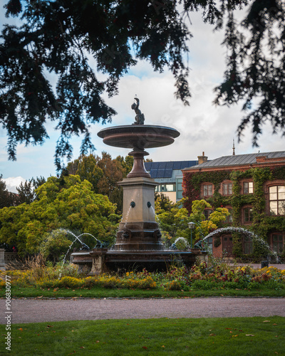 The fountain in the park Universitetsplatsen in Lund Sweden in autumn photo