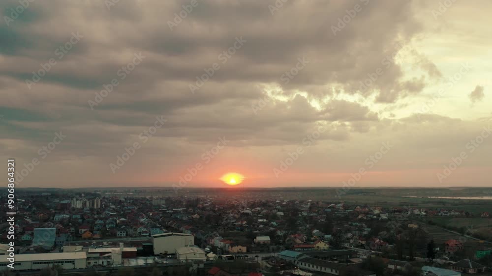 Beautiful sunset on the outskirts of the city from a drone. Sunset from a bird's eye view. Beautiful sunset on the outskirts of the city from a drone. Sunset from a bird's eye view.