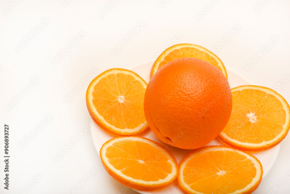 Sliced oranges on a white background. Chopped fruits. Sliced oranges on a white background. Chopped fruits.