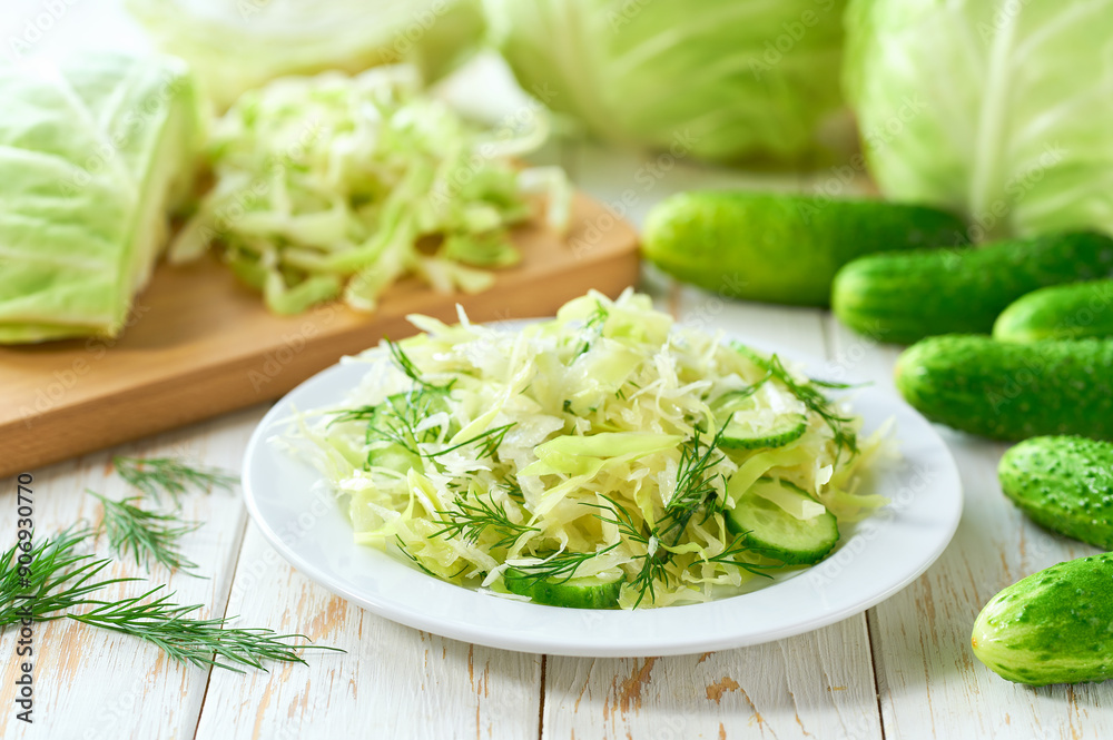 healthy vegetable salad of cabbage,cucumber and dill menu concept, selective focus. healthy vegetable salad of cabbage,cucumber and dill menu concept, selective focus.