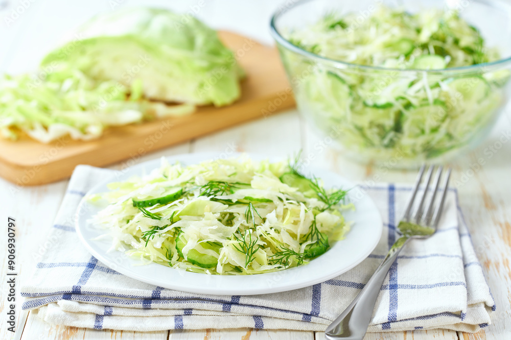 crispy organic green cabbage salad in a plate, selective focus. crispy organic green cabbage salad in a plate, selective focus.