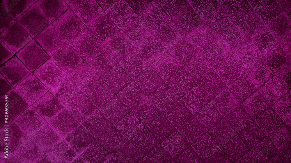 Fototapeta premium rough wet street violet pathway in grid pattern for design, top view. cobble granite stone, square shape in grid on the outdoor pathway. purple sidewalk texture made of stone tiles.