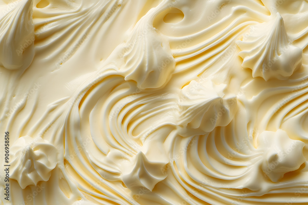 Soft whipped butter textured background. Creamy surface and texture is swirled and mixed Soft whipped butter textured background. Creamy surface and texture is swirled and mixed