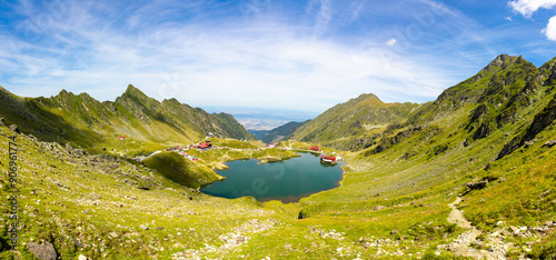 Landscape with Balea lake in Fagaras mountains - Romania seen from above. Aerial view of the Balea lake from Tranfagarasan photo