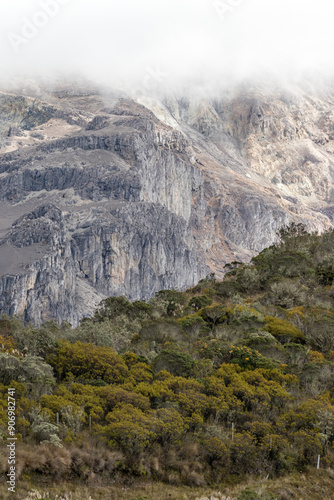 clouds over the mountains and forest