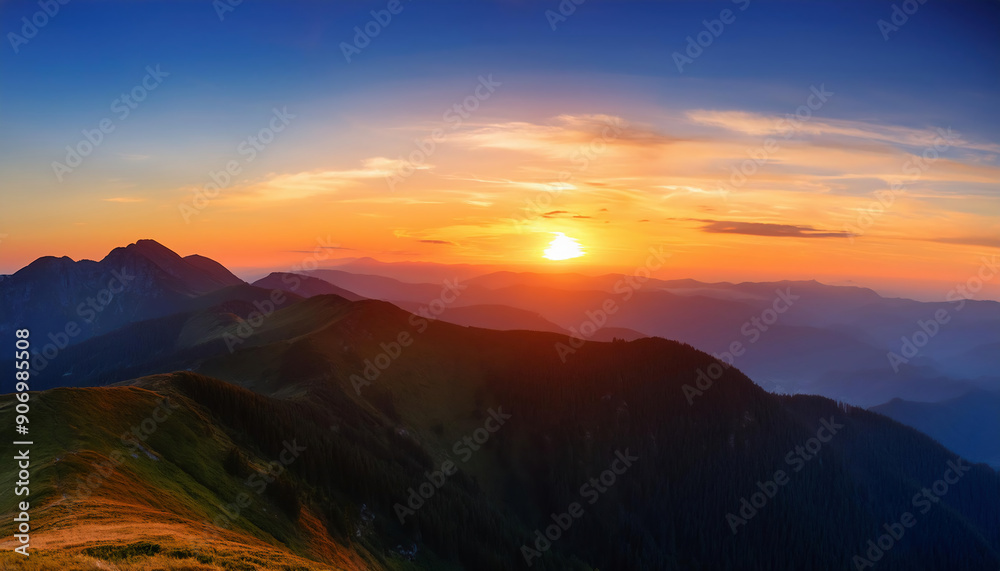 Fototapeta premium Colorful sunset in the mountains. View from the top of the mountain.