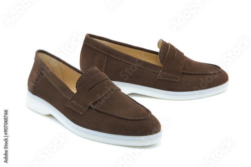 Pair of fashionable stylish suede leather loafer shoes isolated on white background. View from all sides.