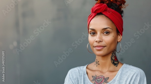 Young Woman With Red Headband Smiling Outdoors in Sunny Environment
