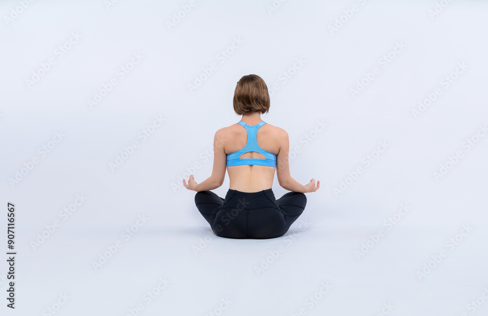 Full body length back rear view gaiety shot athletic and sporty woman doing healthy and meditative yoga exercise workout posture on isolated background. Healthy active and body care lifestyle Full body length back rear view gaiety shot athletic and sporty woman doing healthy and meditative yoga exercise workout posture on isolated background. Healthy active and body care lifestyle