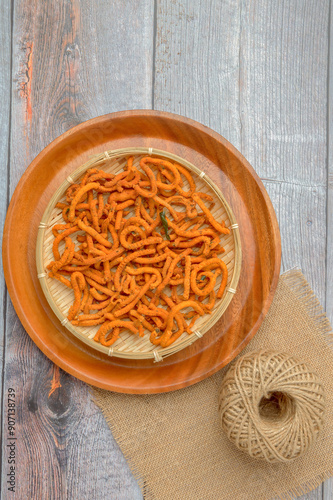 Round sev, a tea time delicacy from Asian India.Also known as Gunchla sev Gunchala sev or kara sev served during festival occasions. Every day snack called kara sev kara sev or spicy sev with pepper photo