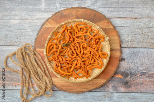 Round sev, a tea time delicacy from Asian India.Also known as Gunchla sev Gunchala sev or kara sev served during festival occasions. Every day snack called kara sev kara sev or spicy sev with pepper photo