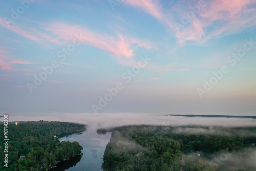 Boothbay Harbor and West Harbor Lake at sunset in Summer with a foggy mist aerial drone photo