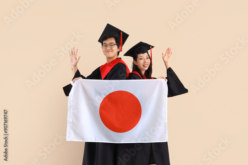 Young Asian graduates with ...