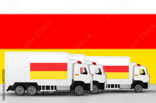 South Ossetia flag depicted on side wall of white delivery van close up. Shipping and local delivery concept photo