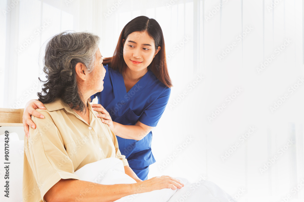 Female doctor nurse take care elderly female patient who is being treated for discomfort due congenital disease gently supporting her shoulder to help her sleep : Elderly health insurance. Female doctor nurse take care elderly female patient who is being treated for discomfort due congenital disease gently supporting her shoulder to help her sleep : Elderly health insurance.