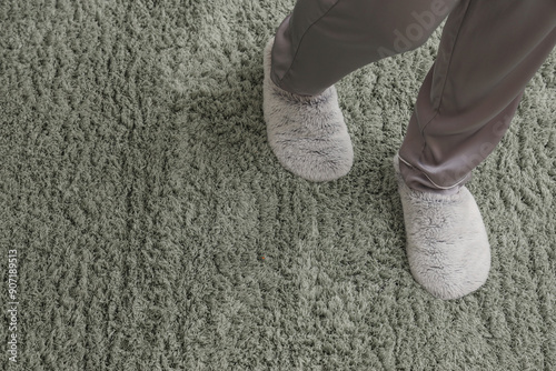 Woman in slippers walking o...
