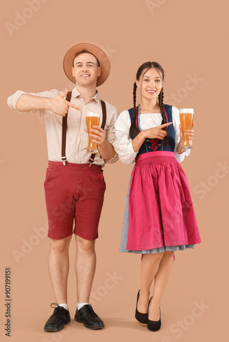 Young happy couple in tradi...