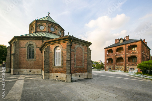 Wansan-gu, Jeonju-si, Jeollabuk-do, South Korea - July 22, 2017: Summer view of yard and building of Jeondong Cathedral
 photo