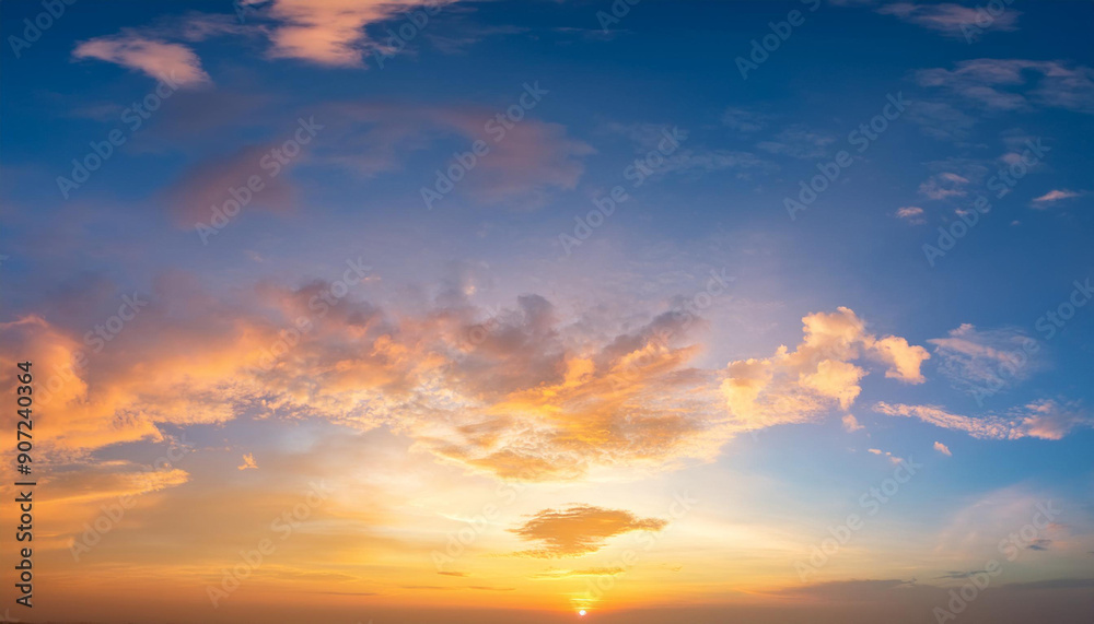 Fototapeta premium Beautiful of luxury soft gradient orange gold clouds and sunlight on the blue sky perfect for the background