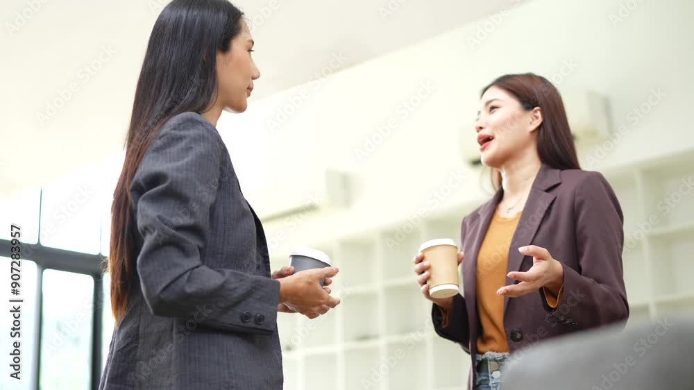Group of Asian business and women sitting and looking at documents at the office. Group of Asian business and women sitting and looking at documents at the office.