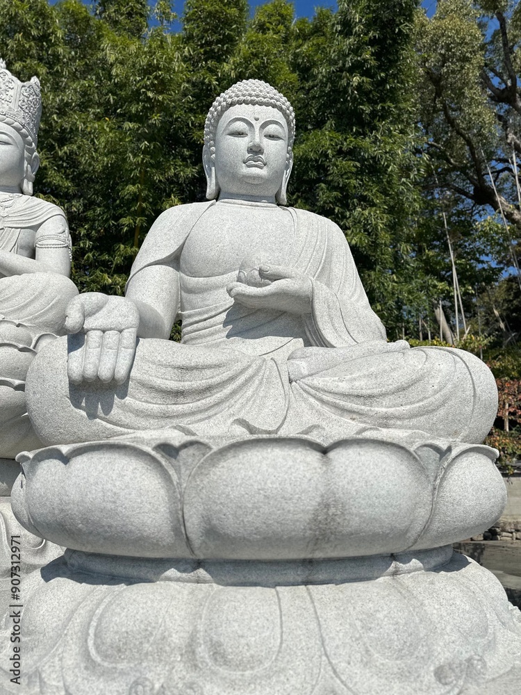 Seated buddha statue - palm down
