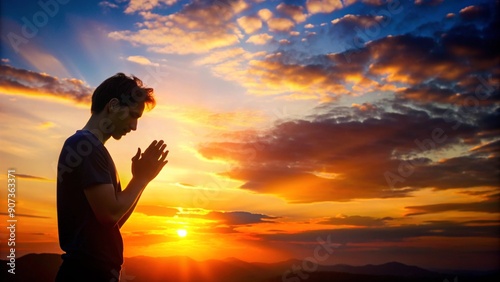 prayer concept silhouette of a young man