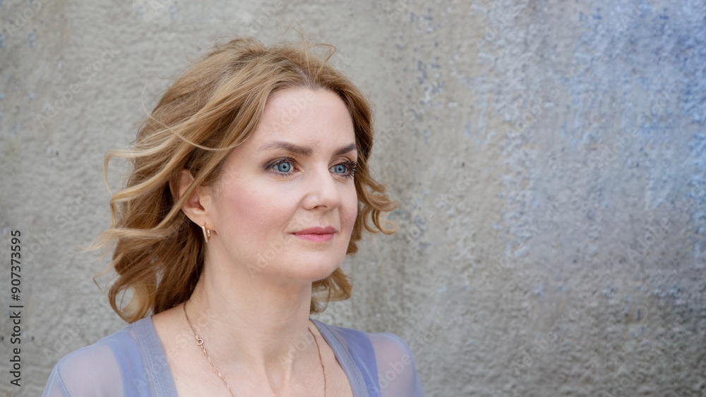 Portrait of a woman against the wall. Portrait of a woman against the wall.
