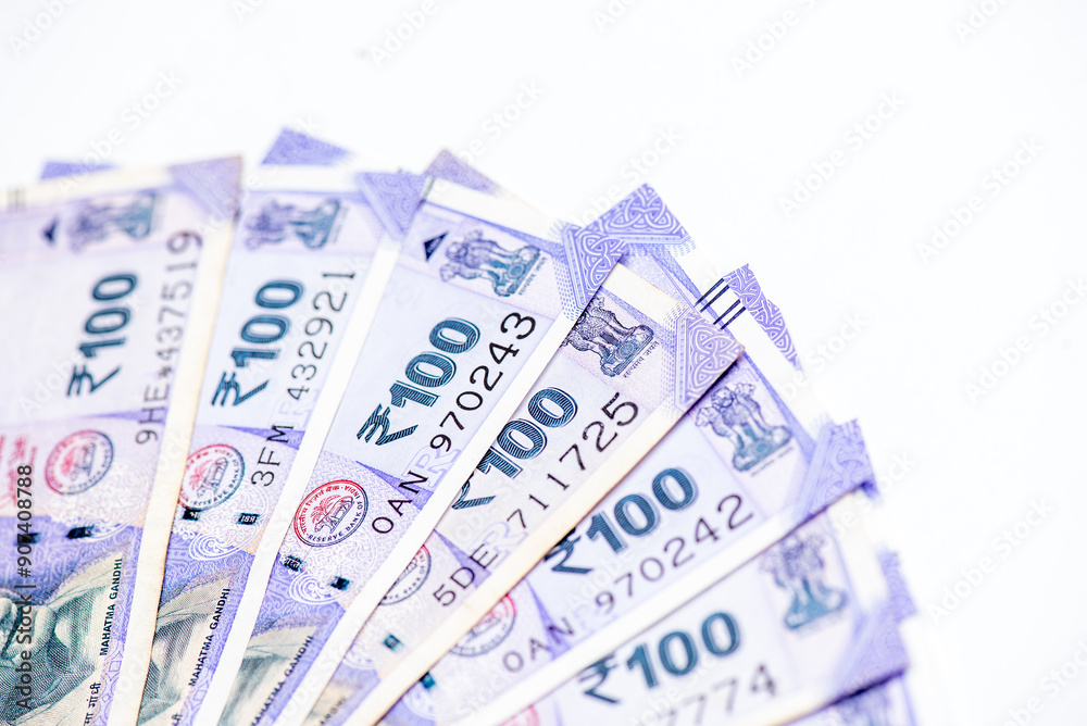 Too many Indian one hundred rupees isolated on white background Too many Indian one hundred rupees isolated on white background