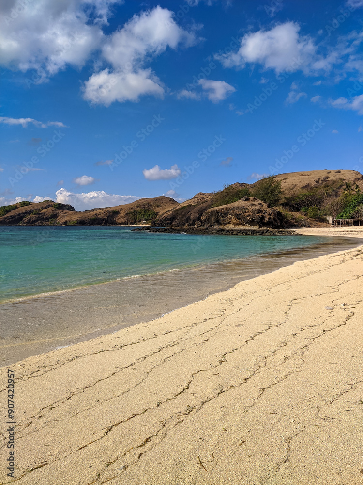 Kuta Lombok has beautiful beaches and surf spots, Kuta Mandalika Beach Lombok, beach with blue sky and clouds, beach in the summer, beach with trees
